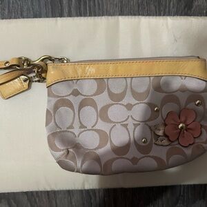 Coach Beige Signature Canvas Wristlet with Yellow Trim & Pink Flower